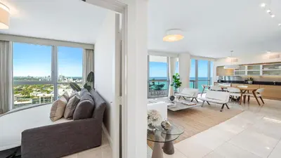 a living room with a tub and a dining room at Oceanview Private Penthouse Condo at The Setai -3903 in Miami Beach