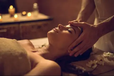 a woman getting a massage in a bath room at Direct Oceanfront Condo - Hyde Resort in Hollywood