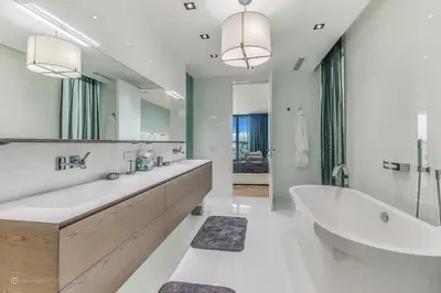 a bathroom with a large tub and a large mirror at Best Sunset Bayfront - pool jacuzzi pool table in Miami Beach