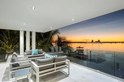 a living room with a view of the water at Best Sunset Bayfront - pool jacuzzi pool table in Miami Beach