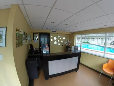 an office with a swimming pool and a desk at Silver Seas Beach Resort in Fort Lauderdale