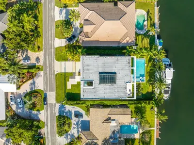 an overhead view of a house next to the water at Exquisite Modern Marvel in Golden Isles