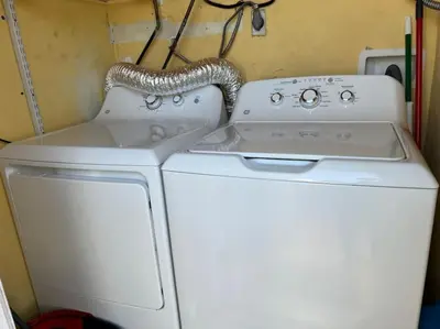 a white washer and dryer in a room at Home Sweet Home Near Malls and Airport and Hwy in South Miami