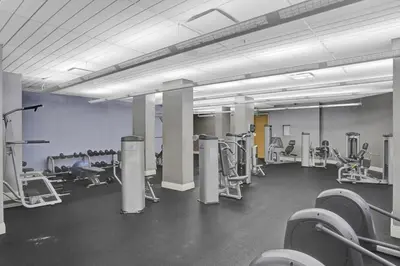 a gym with rows of chairs and machines at Beautiful 1 1 Beach View 14 Floor in Hollywood