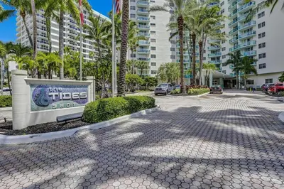 a street in a city with palm trees and a sign at Beautiful 1 1 Beach View 14 Floor in Hollywood