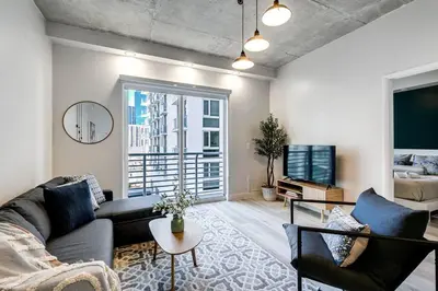 a living room with a couch and a tv at Contemporary Loft in Beautiful Down 4 people 1608 in Miami