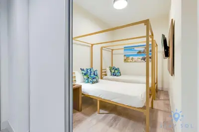 a bedroom with a bed and a mirror at Cozy Apartment - Hollywood Beach - Amazing Pool in Hollywood
