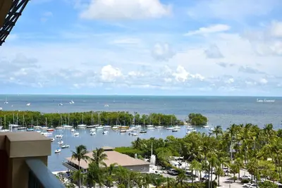 a view of a marina with boats in the water at Ocean View 2bd2bth Hotel In Coconut Grove in Miami