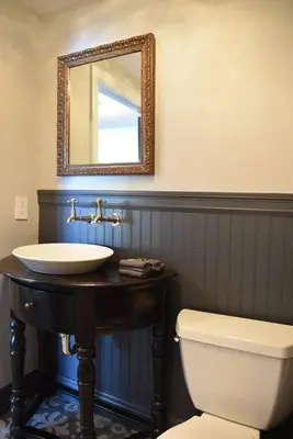 a bathroom with a sink and a toilet and a mirror at Sight Of Sail Boats! Tranquil 115 Coconut Grove in Miami