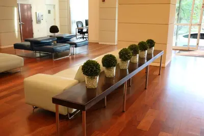 a living room with a table with potted plants on it at Amazing Studio - Walking Distance To Cocowalk in Miami
