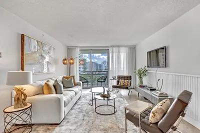 a living room with a couch and a table at LUXURY APARTMENT - Direct Bay in South Beach in Miami Beach