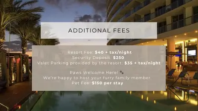a sign in front of a building with a pool at Splendid Resort - Oceanview 1BDR & 1BA Apt Right on the Beach, Heated pool, GYM in Hollywood
