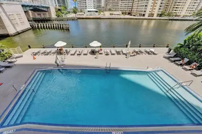 an overhead view of a large swimming pool in a city at Upscale Resort 4 Bedrooms 3 Bath in Hallandale Beach