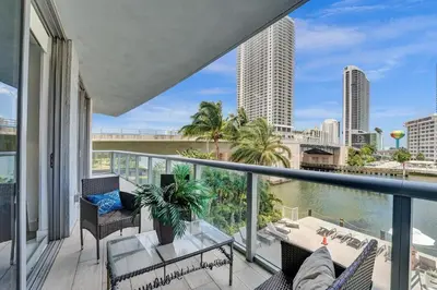 a balcony with a view of the city at Upscale Resort 4 Bedrooms 3 Bath in Hallandale Beach