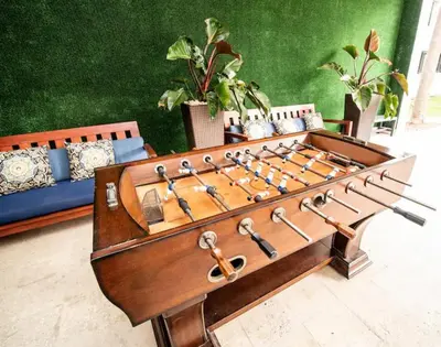 a large wooden foosball at Spacious apartment of 2BR - 2BTH near of the beach great price in Miami Beach