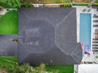 an overhead view of a black screen in a yard at VillaLee Luxury Heated Pool & Spa Sauna Golf in North Miami