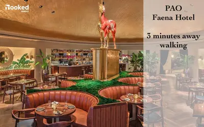 a restaurant with a horse statue in the middle at Newely remodeled apartment only 1 min to the beach! in Miami Beach