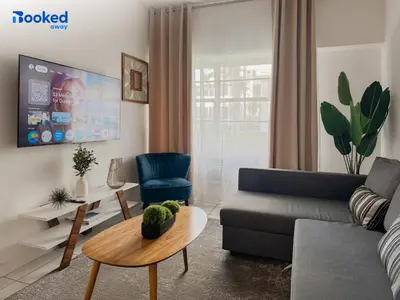 a living room with a couch and a table at MIAMI BEACH HOME NEAR THE OCEAN in Miami Beach