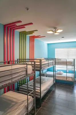 a room with a bunch of bunk beds at Beds n' Drinks in Miami Beach