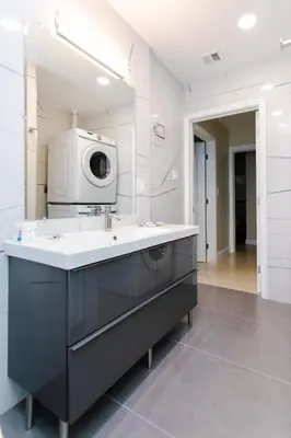a kitchen with a sink and a microwave at First-Class 5BR Villa in Hollywood Lakes in Hollywood
