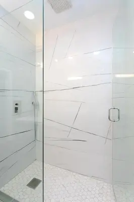 a shower with a glass door in a bathroom at First-Class 5BR Villa in Hollywood Lakes in Hollywood