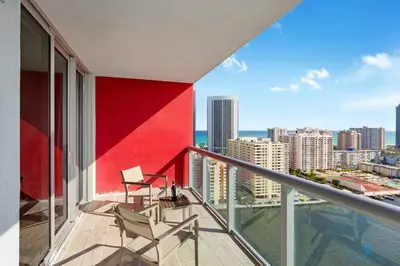 a balcony with a view of the city at Infinite View - Balcony - Pool - Gym - Near Beach in Hallandale Beach