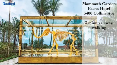 a glass display case with a dinosaur statue in it at YOUR VACATION HOME! NEAR THE BEACH in Miami Beach