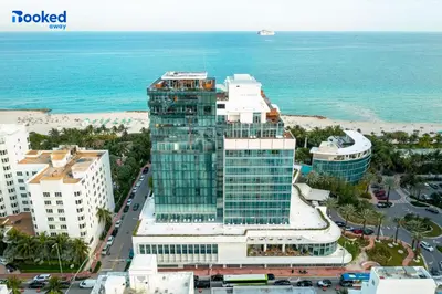 an aerial view of a tall building next to the ocean at YOUR VACATION HOME! NEAR THE BEACH in Miami Beach