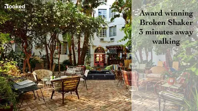 a picture of a patio with chairs and tables at OCEAN & SAND ONLY 1 MINUTE WALK! in Miami Beach