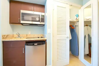 a kitchen with a sink and a microwave at Breathtaking 2 Bedroom Condo Placed at Ritz Carlton-Key Biscayne in Miami