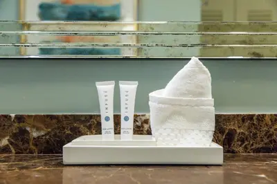 a couple of toothbrushes sitting on top of a holder at Breathtaking 2 Bedroom Condo Placed at Ritz Carlton-Key Biscayne in Miami