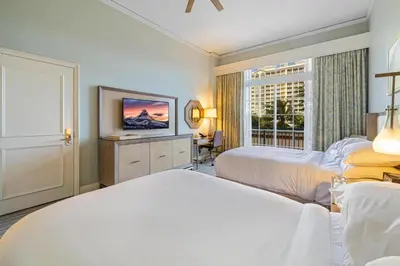 a hotel room with two beds and a window at Charming 5 Star Condo Unit Situated at Ritz Carlton-Key Biscayne in Miami