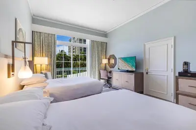 a bedroom with two beds and a window at Lovely Deluxe Unit Located at Ritz Carlton - Key Biscayne! in Miami