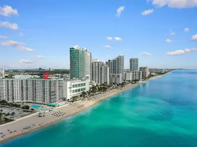 an aerial view of a beach with buildings and the ocean at Penthouse Beach Front 1st line, 2 BR, 2 BA, New Decoration & Furnitures, unobstructed view of the beautiful Atlantic, free parking in Hollywood