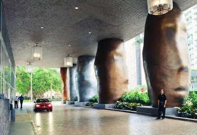 a man standing in the middle of a building at 38th floor W residence with amenities in Miami
