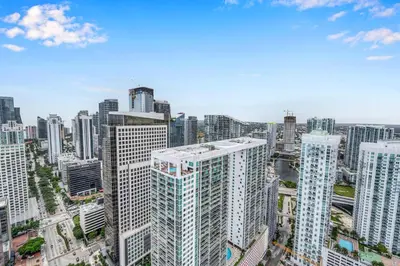 an aerial view of a city with tall buildings at Highest floor Icon W Brickell Location in Miami