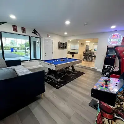 Modern Tropical Oasis with Arcade