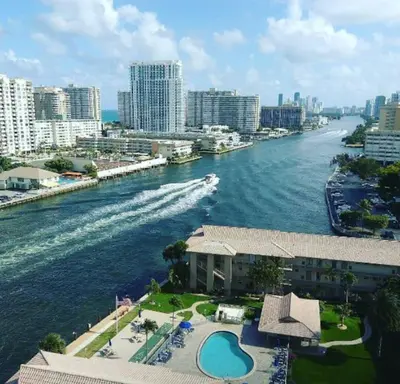 a view of a river in a city with buildings at Ocean Air & 2 Cozy Full Beds, Relaxing Beach Studio in Hallandale Beach