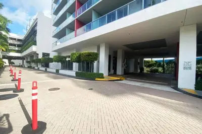 a building with red and white cones in front of it at Studio with 2 Full Beds, Your Beach Base in the City in Hallandale Beach