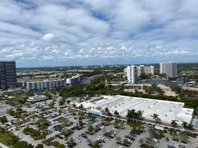 an aerial view of a parking lot in a city at Beachy Vibes Studio, 2 Full Beds, Near Everything in Hallandale Beach