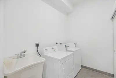 a white bathroom with a sink and a toilet at Up to 12 Guests! Modern villa near Wynwood in Miami