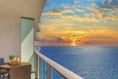 a view of the ocean from a balcony at Insane Ocean View Balcony Beachfront Condo Pool in Hollywood