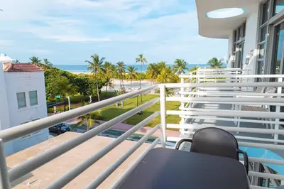 a balcony with a view of the beach and the ocean at 1 Bedroom with King Bed and Roof-Top Pool and Bar C503 in Miami Beach