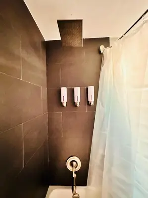 a bathroom with a sink and a shower at Ft Lauderdale - Oasis in Fort Lauderdale