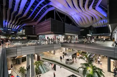 an overhead view of a shopping mall with people in it at Luxury Sky Villa with City and Ocean Views in Miami