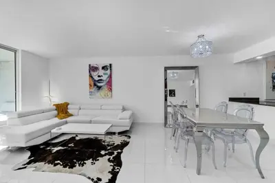 a living room with a couch and a table at Modern Sky Residence with Ocean and City Views in Miami