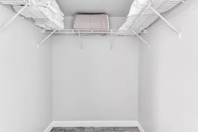 a room with two bunk beds in a white room at Majestic Penthouse with Ocean and City Views in Miami