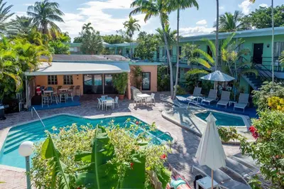 an aerial view of a resort with a swimming pool at Victoria Park Hotel in Fort Lauderdale