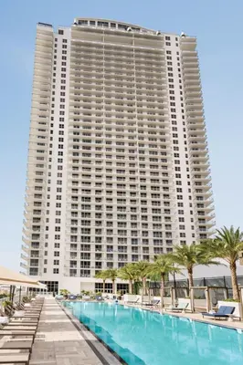 a large building with a swimming pool in front of it at Oceanview 2BR Suite At Hyde Beach House - 5☆ Amenities in Hollywood