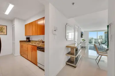 a kitchen with a sink and a counter top at Luxurious private unit with parking in Miami